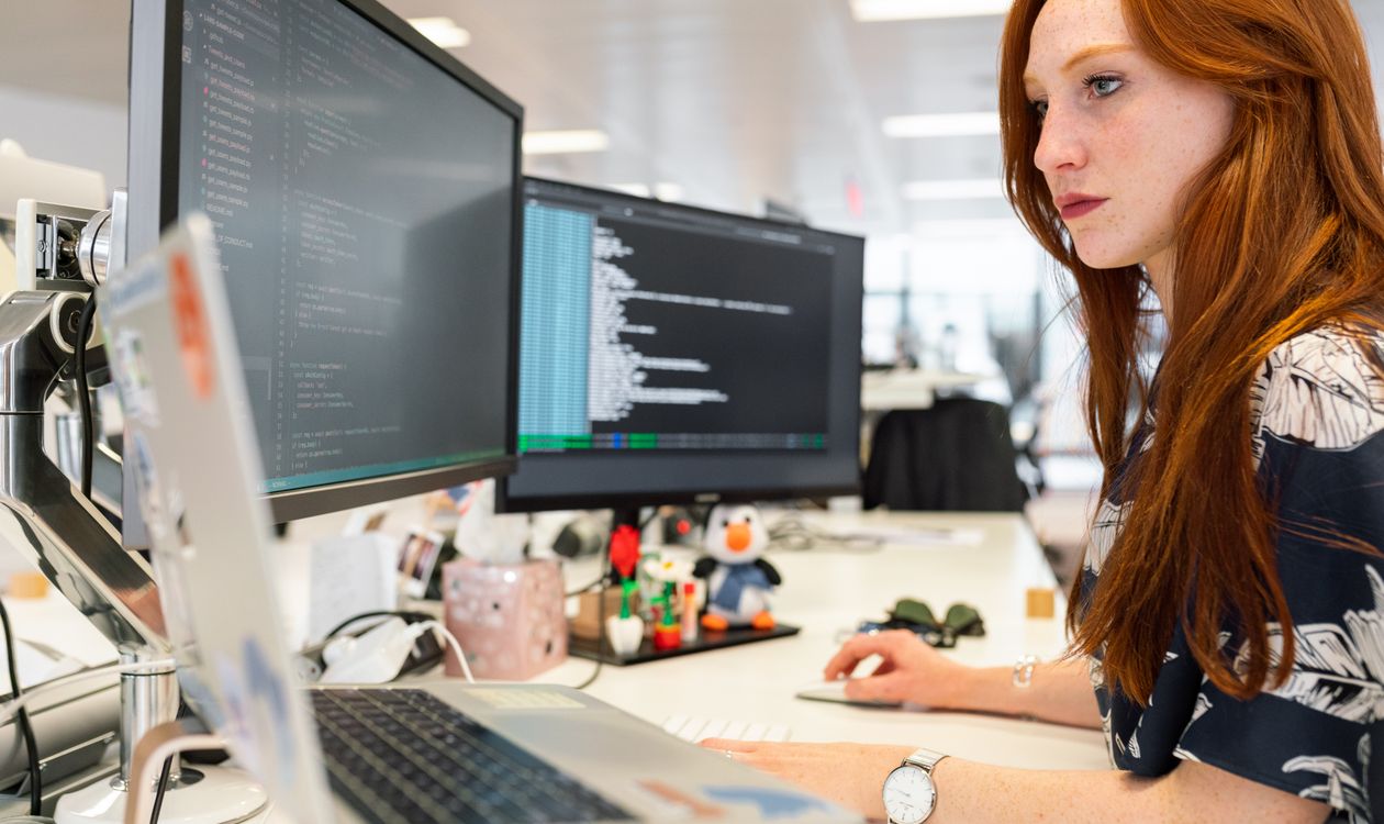 Developer writing code for a custom software project
